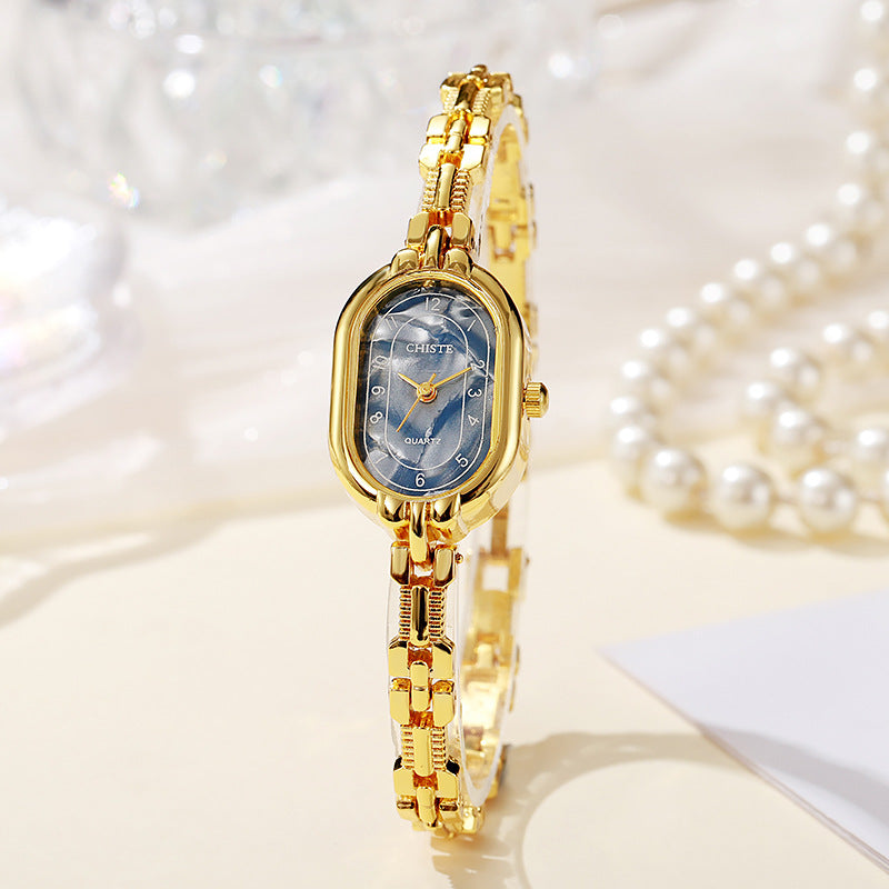 Alira Ur | Guld
