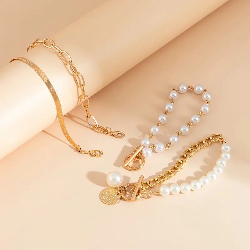 Sæt de Chic Armbånd på 4 Stykker - Slange, Perler og Led | Guld