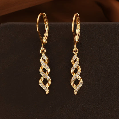Ava Aretes Shimmer Twist | Oro