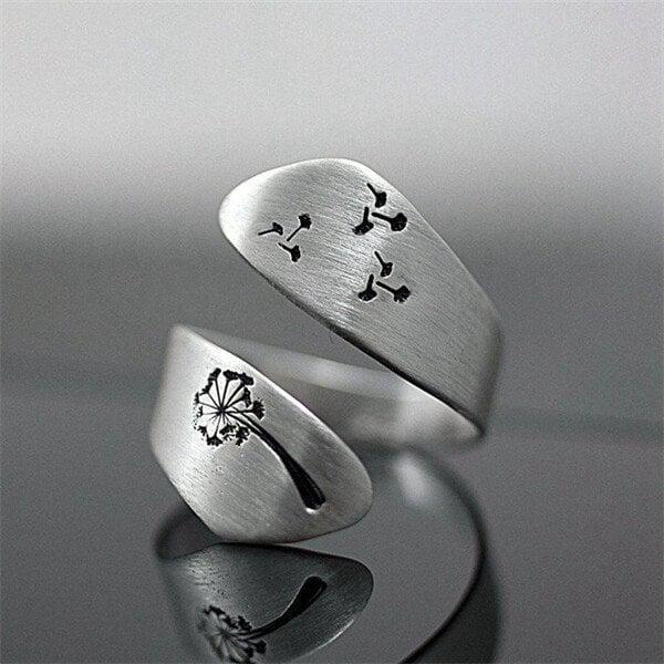 Adjustable hand-carved dandelion ring