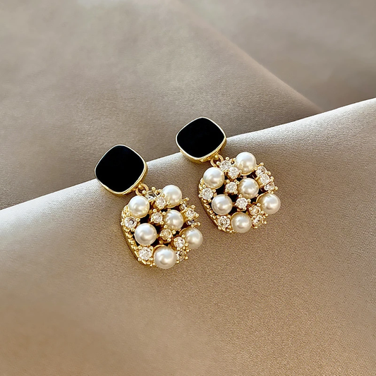 Pearl earrings with black opal in gold